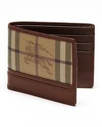 The equestrian knight rides across the exterior check print for an expressive heritage design from Burberry. The equestrian knight rides across the exterior check print for an expressive heritage design from Burberry.