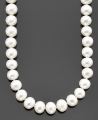 Try on a little sophisticated style. This strand of AA cultured freshwater pearls (10-11 mm) by Belle de Mer is the perfect choice. 14k gold clasp. Approximate length: 18 inches. Try on a little sophisticated style. This strand of AA cultured freshwater pearls (10-11 mm) by Belle de Mer is the perfect choice. 14k gold clasp. Approximate length: 18 inches.