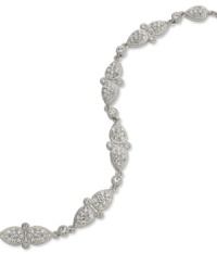 Go around and around. Eliot Danori's all-around Windsor bracelet lends crystal shine with its stunning glass accents and rhodium-plated mixed metal. Approximate length: 6-3/4 inches + 1-inch extender. Go around and around. Eliot Danori's all-around Windsor bracelet lends crystal shine with its stunning glass accents and rhodium-plated mixed metal. Approximate length: 6-3/4 inches + 1-inch extender.
