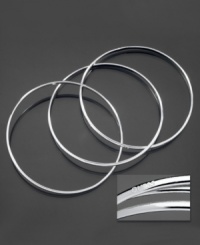 Slip on three slinky bangles and add instant sexiness to your look. This set of three bracelets by GUESS is crafted in polished silvertone mixed metal with embossed logo on one bangle. Approximate diameter: 2-5/16 inches. Slip on three slinky bangles and add instant sexiness to your look. This set of three bracelets by GUESS is crafted in polished silvertone mixed metal with embossed logo on one bangle. Approximate diameter: 2-5/16 inches.
