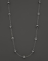 This bold sterling silver station necklace, gleaming with black onyx, is a brilliant showcase for Di MODOLO's iconic Triadra design.