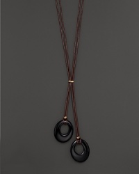 Onyx adds rich shine to 14K yellow gold and leather. By Nancy B. Onyx adds rich shine to 14K yellow gold and leather. By Nancy B.