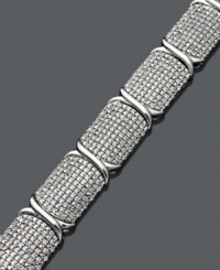 Three carats of sparkling sophistication is certain to turn heads. This chic bracelet features a sleek crisscross setting in sterling silver decorated with dozens of round-cut diamonds (3 ct. t.w.). Approximate length: 7-1/4 inches. Three carats of sparkling sophistication is certain to turn heads. This chic bracelet features a sleek crisscross setting in sterling silver decorated with dozens of round-cut diamonds (3 ct. t.w.). Approximate length: 7-1/4 inches.