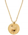 Roundabout fashion. The disc pendant necklace from Robert Lee Morris is crafted from gold-tone mixed metal and features a hammered look for a style twist. Approximate length: 17 inches + 3-inch extender. Approximate drop: 2 inches.