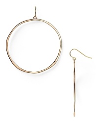 Simplicity rules with this pair of rose gold plated hoop earrings from Gorjana, flaunting a barely there design and delicate dangle. Simplicity rules with this pair of rose gold plated hoop earrings from Gorjana, flaunting a barely there design and delicate dangle.