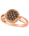Add delicate flair with deliciously-hued diamonds. Le Vian's sparkling oval ring features round-cut chocolate diamonds (3/8 ct. t.w.) encircled by white diamond accents. Crafted in 14k rose gold. Size 7.