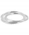 Understated elegance. Robert Lee Morris takes a simple, yet refined approach in this set of bangles crafted from silver-tone mixed metal.  Approximate diameter: 2-1/2 inches.