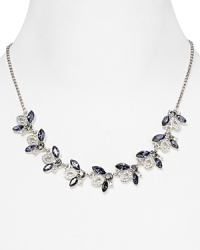 Delicate clusters of colored stones are a glamorous focal point on this Carolee necklace, crafted of silver plated metal. Delicate clusters of colored stones are a glamorous focal point on this Carolee necklace, crafted of silver plated metal.