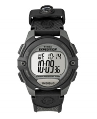 Navigate the great outdoors with the built-in compass on this Timex Expedition watch. Charcoal canvas strap with compass and round resin case. Black bezel with two lugs. Digital dial features initial time, seconds, day and date. Digital movement. Water resistant to 100 meters. One-year limited warranty. Navigate the great outdoors with the built-in compass on this Timex Expedition watch. Charcoal canvas strap with compass and round resin case. Black bezel with two lugs. Digital dial features initial time, seconds, day and date. Digital movement. Water resistant to 100 meters. One-year limited warranty.