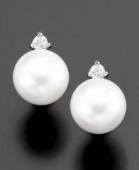 Capture the beauty of the ocean with Belle de Mer's gorgeous cultured freshwater pearl stud earrings (6-1/2-7 mm) complete with diamond accents set in 14k gold. Capture the beauty of the ocean with Belle de Mer's gorgeous cultured freshwater pearl stud earrings (6-1/2-7 mm) complete with diamond accents set in 14k gold.
