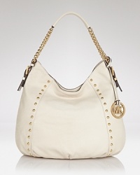Throw something exotic over your shoulder with this carryall from MICHAEL Michael Kors. In python embossed leather with perfect proportions, it's the daytime bag that no outfit should be without. Throw something exotic over your shoulder with this carryall from MICHAEL Michael Kors. In python embossed leather with perfect proportions, it's the daytime bag that no outfit should be without.