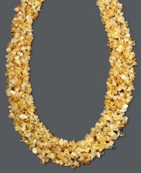 Add a splash of citrus to your neckline. This citrine chip (4-6 mm) necklace will bring a warmth to your look with its rich, golden hues. Toggle clasp crafted in 14k gold. Approximate length: 20 inches.