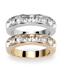 A dynamic--and dazzling!--duo: Swarovski's band rings sparkle plenty with bezel-set, square-cut clear crystals. Set in silver tone and gold tone mixed metal, they'll look stylish whether worn separately or together. Size 7. A dynamic--and dazzling!--duo: Swarovski's band rings sparkle plenty with bezel-set, square-cut clear crystals. Set in silver tone and gold tone mixed metal, they'll look stylish whether worn separately or together. Size 7.