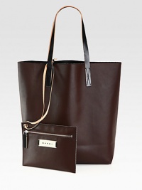 A roomy, leather-like carryall with contrast leather straps and a detachable coin pouch for easy access to all your smaller essentials.Double shoulder strap, 9 dropOpen topDetachable coin pouchCotton/polyurethane13W X 15¾H X 6DMade in Italy A roomy, leather-like carryall with contrast leather straps and a detachable coin pouch for easy access to all your smaller essentials.Double shoulder strap, 9 dropOpen topDetachable coin pouchCotton/polyurethane13W X 15¾H X 6DMade in Italy
