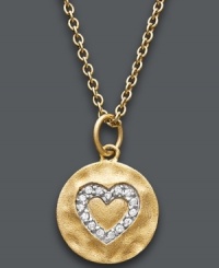 It's time to let love shine. Studio Silver's dazzling heart pendant features an imprinted crystal design set in 18k gold over sterling silver. Approximate length: 16 inches + 1-1/2-inch extender. Approximate drop: 3/4 inch. It's time to let love shine. Studio Silver's dazzling heart pendant features an imprinted crystal design set in 18k gold over sterling silver. Approximate length: 16 inches + 1-1/2-inch extender. Approximate drop: 3/4 inch.