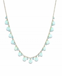 Like brilliant blue skies, this collection of apatite (3 mm) and chalcedony (7 mm) gemstones creates a breathtaking view across this shapely necklace. Gems are set in 14k gold. Approximate length: 16 inches. Like brilliant blue skies, this collection of apatite (3 mm) and chalcedony (7 mm) gemstones creates a breathtaking view across this shapely necklace. Gems are set in 14k gold. Approximate length: 16 inches.