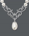 This necklace proves paisley isn't just for prints. An intricate cut-out design adorned with round-cut diamonds (3/8 ct. t.w.) and cultured freshwater pearls (8 mm x 12 mm) creates a standout look. Set in 14k white gold. Approximate length: 16 inches. Approximate drop: 1-1/2 inches.