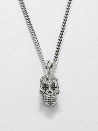 Sterling silver 'Small Day Of The Dead' skull pendant with intricately carved cross-shaped eyes suspends from a curb link chain with signature logo detail.Sterling silverLength about 24Lobster claspMade in USA Sterling silver 'Small Day Of The Dead' skull pendant with intricately carved cross-shaped eyes suspends from a curb link chain with signature logo detail.Sterling silverLength about 24Lobster claspMade in USA