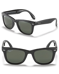 Conveniently compact, these folding wayfarer sunglasses from Ray-Ban offer the iconic style in an instantly-stowable shape. Conveniently compact, these folding wayfarer sunglasses from Ray-Ban offer the iconic style in an instantly-stowable shape.