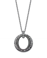 The name speaks for itself. You'll be stunned by Eliot Danori's Star Struck Circle Pendant. A cut-out circle shines with the addition of sparkling crystals. Crafted in anthracite tone mixed metal. Approximate length: 36 inches. Approximate drop: 1-1/2 inches. The name speaks for itself. You'll be stunned by Eliot Danori's Star Struck Circle Pendant. A cut-out circle shines with the addition of sparkling crystals. Crafted in anthracite tone mixed metal. Approximate length: 36 inches. Approximate drop: 1-1/2 inches.