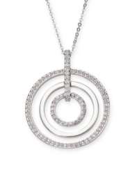 A modern interpretation on the popular circle silhouette. Concentric circles shimmer in clear Swarovski crystal pavé. Setting and chain crafted in silver tone mixed metal. Approximate length: 19-1/2 inches. Approximate drop: 1-3/4 inches. A modern interpretation on the popular circle silhouette. Concentric circles shimmer in clear Swarovski crystal pavé. Setting and chain crafted in silver tone mixed metal. Approximate length: 19-1/2 inches. Approximate drop: 1-3/4 inches.