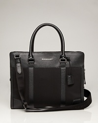 A modern man essential, this handsome briefcase adjusts perfectly to your needs with excellent organizational pockets and an adjustable strap for longer journeys. A modern man essential, this handsome briefcase adjusts perfectly to your needs with excellent organizational pockets and an adjustable strap for longer journeys.