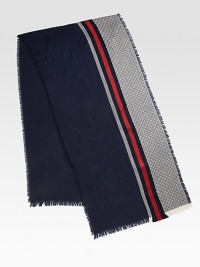 Midnight blue and red in wool/silk with fringe.55% wool/45% silk20W x 79HDry cleanMade in Italy Midnight blue and red in wool/silk with fringe.55% wool/45% silk20W x 79HDry cleanMade in Italy