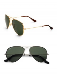 The classic aviator style, now available in super-lightweight, utterly stylish titanium. Available in arista frames with crystal green lenses and titanium-color frames with grey lenses. UV400 lens 100% UV protective Made in Italy The classic aviator style, now available in super-lightweight, utterly stylish titanium. Available in arista frames with crystal green lenses and titanium-color frames with grey lenses. UV400 lens 100% UV protective Made in Italy