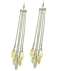 Beach chic. GUESS combines the latest tassel trend with intricate marquise-cut Mother of Pearl accents. Five-row design crafted in imitation rhodium-plated mixed metal. Approximate drop: 6 inches.