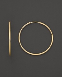 Simply chic, these 14K. yellow gold hoops are timeless classics. Simply chic, these 14K. yellow gold hoops are timeless classics.