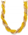 Bubbly and vibrant, this citron and gold torsade necklace from INC International Concepts features twisted chains in citron tone and 14k gold-plated mixed metal. Approximate length: 16 inches + 3-inch extender.