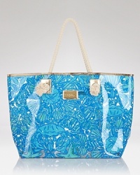 A seaside scene of shells, crustaceans, starfish and seaweed goes glam with gilded golden trim. From Lilly Pulitzer. A seaside scene of shells, crustaceans, starfish and seaweed goes glam with gilded golden trim. From Lilly Pulitzer.