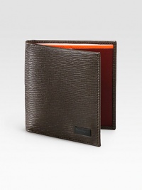 Slim design crafted in Italy from pebbled Italian leather, highlights a side profile with a bold, contrasting interior and plenty of slots to keep your cards neatly secured.One billfold compartmentEight card slotsLeather4W x 3HMade in Italy Slim design crafted in Italy from pebbled Italian leather, highlights a side profile with a bold, contrasting interior and plenty of slots to keep your cards neatly secured.One billfold compartmentEight card slotsLeather4W x 3HMade in Italy