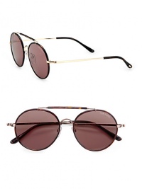 A handsome set of round frames crafted in sleek metal. Available in shiny rose gold frames with brown lenses.Metal100% UV ProtectionMade in Italy A handsome set of round frames crafted in sleek metal. Available in shiny rose gold frames with brown lenses.Metal100% UV ProtectionMade in Italy