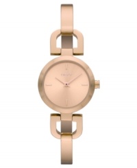 Fashioned with a unique bangle bracelet, this rosy DKNY watch is an everyday charmer. Fashioned with a unique bangle bracelet, this rosy DKNY watch is an everyday charmer.