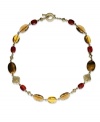 A wonderful mix of color and intrigue. Lauren Ralph Lauren's toggle necklace features multicolored resin, glass and semi-precious tiger's eye beads in antique 14k gold-plated mixed metal. Approximate length: 18 inches.