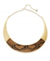 Slithering sophistication. Alfani's exotic-chic collar necklace features a modern curved design with brown python-embossing, set in gold-tone mixed metal. Approximate length: 16 inches + 3-inch extender. Approximate drop length: 4-1/2 inches. Approximate drop width: 5-1/2 inches.