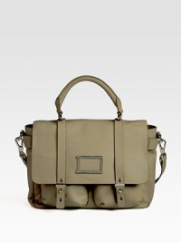 Gorgeous leather stores all your essentials in this roomy top-handle carryall crafted in a classic buckle-flap silhouette.Top handle, 6 dropAdjustable detachable crossbody strap, 16¼-20 dropFlap-snap closureOne outside open pocketTwo outside open pockets under flapOne inside zip pocketTwo inside open pocketsFully lined11½W X 8H X 4DImported Gorgeous leather stores all your essentials in this roomy top-handle carryall crafted in a classic buckle-flap silhouette.Top handle, 6 dropAdjustable detachable crossbody strap, 16¼-20 dropFlap-snap closureOne outside open pocketTwo outside open pockets under flapOne inside zip pocketTwo inside open pocketsFully lined11½W X 8H X 4DImported