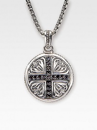A sterling silver medallion is detailed with deep-relief Sparta engraving and a diamond-cut black sapphire cross. 1.36 tcw Medallion, about 1 dia Endless chain, 26 long Made in USA A sterling silver medallion is detailed with deep-relief Sparta engraving and a diamond-cut black sapphire cross. 1.36 tcw Medallion, about 1 dia Endless chain, 26 long Made in USA