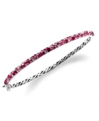 Slim, stackable style. Kaleidoscope's thin shimmering bangle makes a statement all its own, but can also be stacked with similar styles for a trendy layered look. Features round-cut fuchsia, light rose and white confetti crystals with with Swarovski Elements. Set in sterling silver. Bracelet features a hinge clasp. Approximate diameter: 2-1/2 inches. Slim, stackable style. Kaleidoscope's thin shimmering bangle makes a statement all its own, but can also be stacked with similar styles for a trendy layered look. Features round-cut fuchsia, light rose and white confetti crystals with with Swarovski Elements. Set in sterling silver. Bracelet features a hinge clasp. Approximate diameter: 2-1/2 inches.