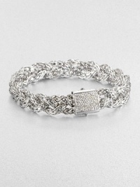 An intricately braided, sterling silver design accented with a dazzling diamond encrusted closure. Sterling silverDiamonds, .42 tcwLength, about 7.25Push clasp closureImported An intricately braided, sterling silver design accented with a dazzling diamond encrusted closure. Sterling silverDiamonds, .42 tcwLength, about 7.25Push clasp closureImported