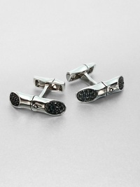 Sterling silver cuff links with black sapphires make a definitive statement to your stylish suiting wardrobe.Sterling silver/black sapphireAbout ¼ x 1.Imported Sterling silver cuff links with black sapphires make a definitive statement to your stylish suiting wardrobe.Sterling silver/black sapphireAbout ¼ x 1.Imported