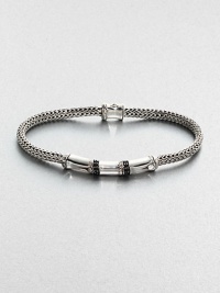 Braided sterling silver bracelet, handsomely accented by a radiant black sapphire closure. .Sterling silver/black sappphireAbout 3 diam.Imported Braided sterling silver bracelet, handsomely accented by a radiant black sapphire closure. .Sterling silver/black sappphireAbout 3 diam.Imported