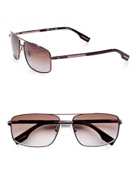 In a classic Navigator style with rectangular metal frames and a temple logo detail, this bold pair packs major cool.Brown gradient polarized lens100% UV protectiveImported In a classic Navigator style with rectangular metal frames and a temple logo detail, this bold pair packs major cool.Brown gradient polarized lens100% UV protectiveImported