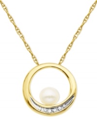 The center of attraction. This pendant, crafted from 10k gold, features a cultured freshwater pearl (6 mm) and diamond accents for a stylish touch. Approximate length: 18 inches. Approximate diameter: 3/4 inch. The center of attraction. This pendant, crafted from 10k gold, features a cultured freshwater pearl (6 mm) and diamond accents for a stylish touch. Approximate length: 18 inches. Approximate diameter: 3/4 inch.