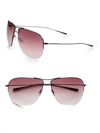 This double-bridge semi-rimless design, featuring a metal front with beta-titanium temples, is ultra lightweight and comfortable. Available in walnut with spice brown gradient lens.100% UV protectionImported This double-bridge semi-rimless design, featuring a metal front with beta-titanium temples, is ultra lightweight and comfortable. Available in walnut with spice brown gradient lens.100% UV protectionImported