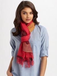 A semi-sheer, woven wrap in a colorblocked design with fringe trim.90% merino wool/10% acrylic80 X 26Hand washImported A semi-sheer, woven wrap in a colorblocked design with fringe trim.90% merino wool/10% acrylic80 X 26Hand washImported