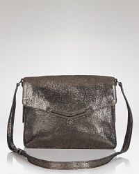 What happens when cool meets ladylike? Botkier's satchel which works a punchy-poised vibe, finished in leather and detailed with a turnlock closure which opens to a spacious interior. What happens when cool meets ladylike? Botkier's satchel which works a punchy-poised vibe, finished in leather and detailed with a turnlock closure which opens to a spacious interior.