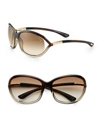 Round modified metal frames with open-end lens and tubular temples. Available in bronze with gradient brown lens.Tubular temples100% UV protectionMade in Italy Round modified metal frames with open-end lens and tubular temples. Available in bronze with gradient brown lens.Tubular temples100% UV protectionMade in Italy
