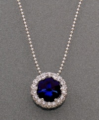The only piece of jewelry you'll need to make your mark. CRISLU's mesmerizing round-cut blue corundum (2 ct. t.w.) pendant is surrounded by glittering cubic zirconia (3/4 ct. t.w.). Crafted in platinum over sterling silver. Approximate length: 26 inches. Approximate drop: 1/2 inch. The only piece of jewelry you'll need to make your mark. CRISLU's mesmerizing round-cut blue corundum (2 ct. t.w.) pendant is surrounded by glittering cubic zirconia (3/4 ct. t.w.). Crafted in platinum over sterling silver. Approximate length: 26 inches. Approximate drop: 1/2 inch.